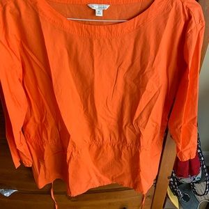 The gap orange shirt with tie back.  3/4” sleeves